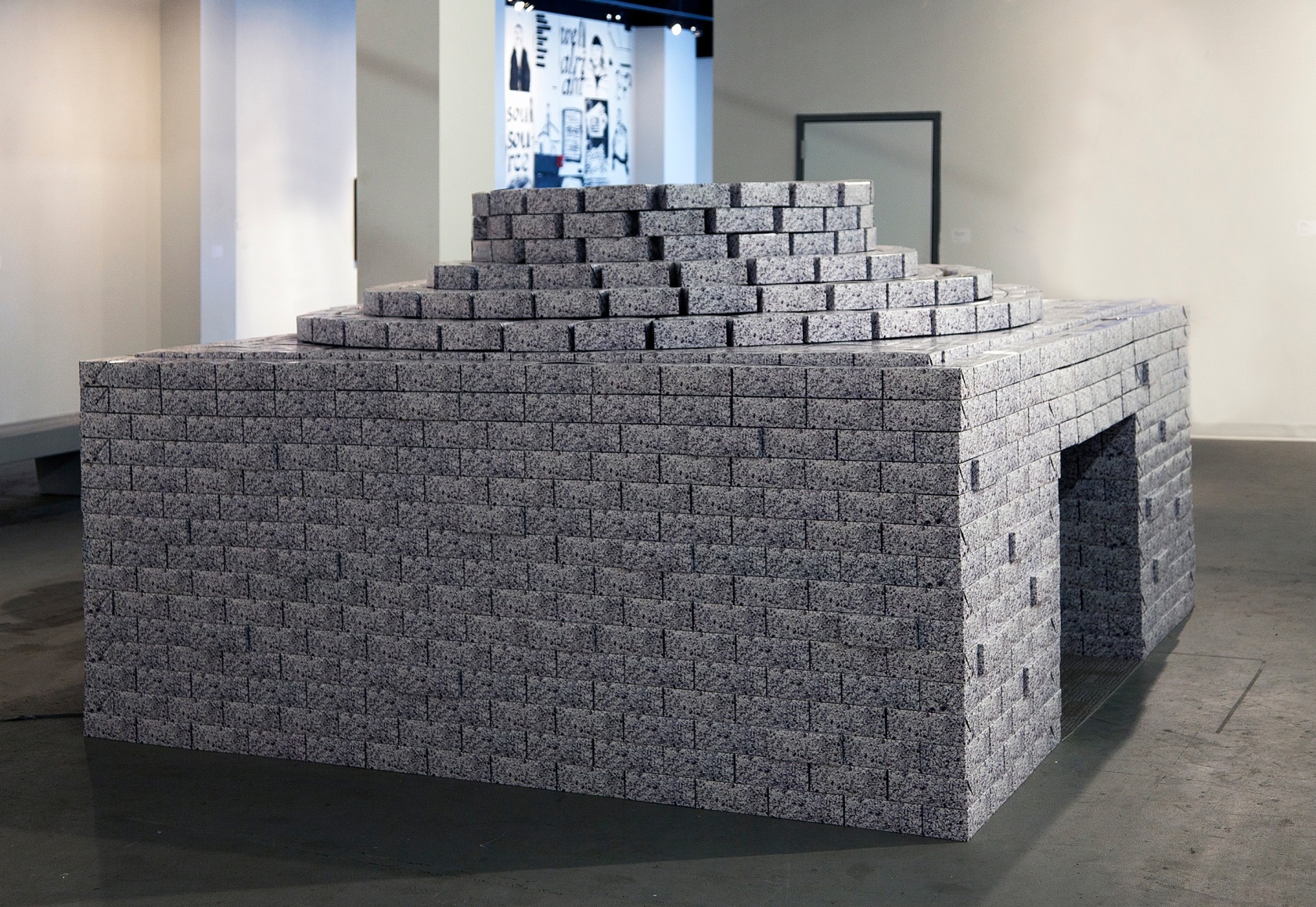 NARA PARK It Was Written On the Wall 2012, paper boxes, vinyl flooring, synthetic plant, vent, 113 x 108 x 71 inches