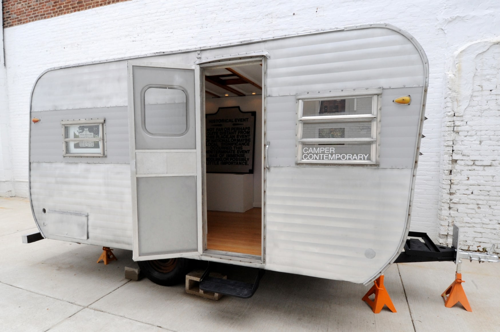 CALDER BRANNOCK Camper Contemporary 2010, altered 1976 Yellowstone camper installed with curate, mobil gallery show. Installation view: Conner Contemporary Art.
