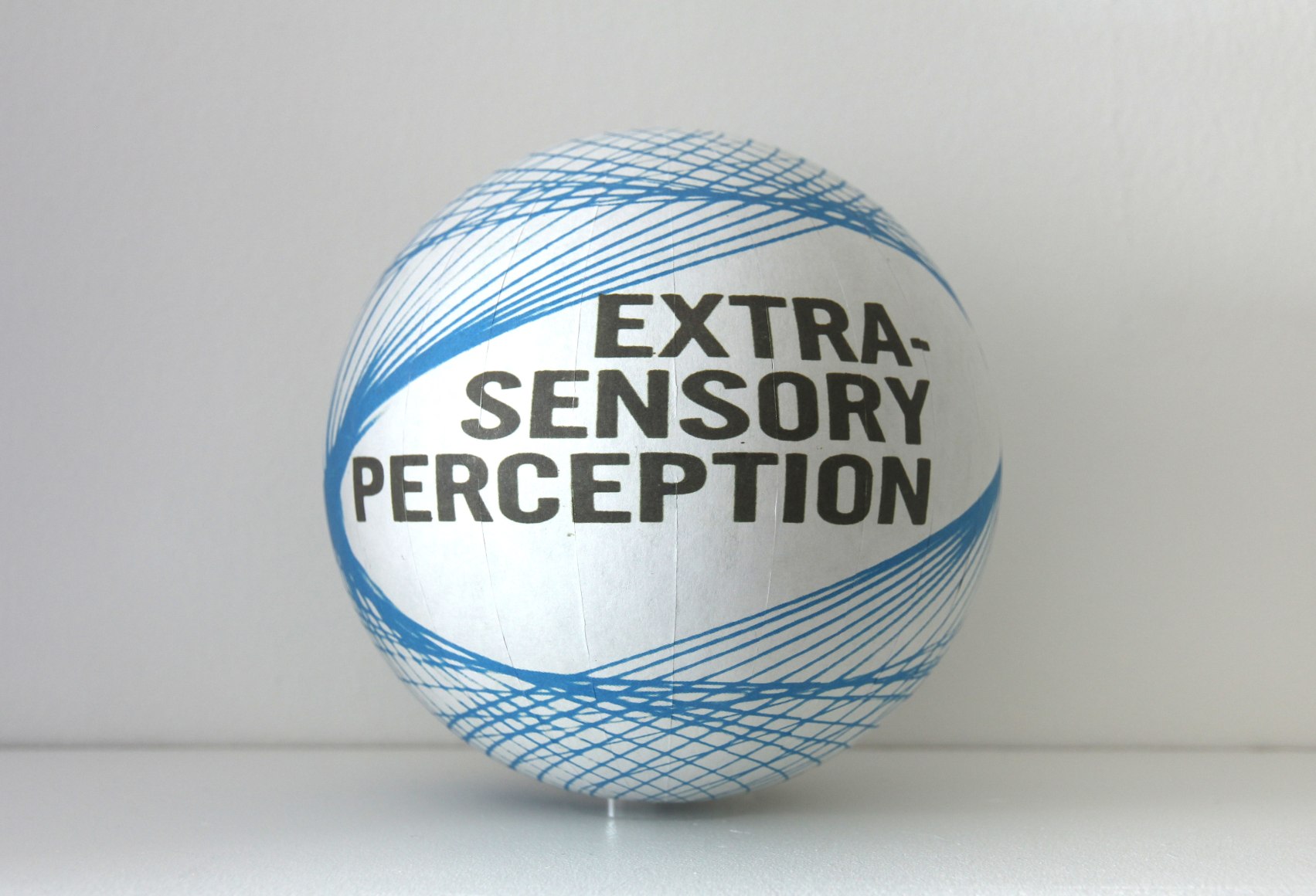 SUSAN MACWILLIAM  Extra-Sensory Perception  2013/2014, inkjet paper, plastic sphere, 6 x 6 x 6 inches