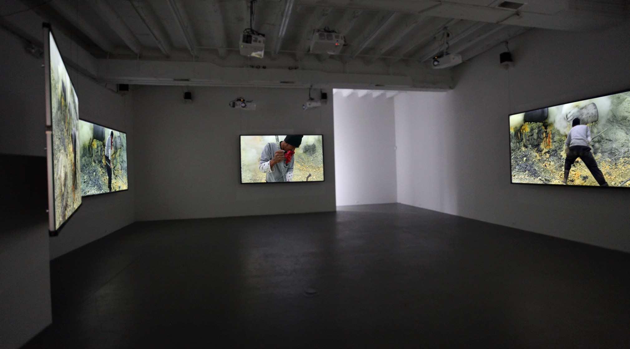 JANET BIGGS A Step on the Sun 2012, 5 channel video installation, run time: 9:22. Installation view: Conner Contemporary Art.