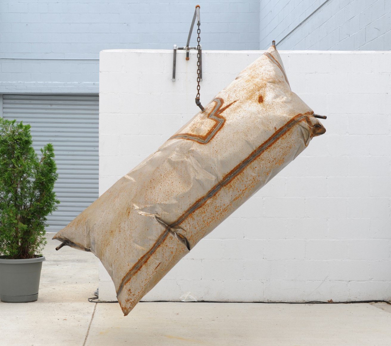 ANDREW SCHROCK Untitled 2009, Hydroformed steel, 96 x 48 inches (diameter). Installation view: ACADEMY 2009, Conner Contemporary Art.