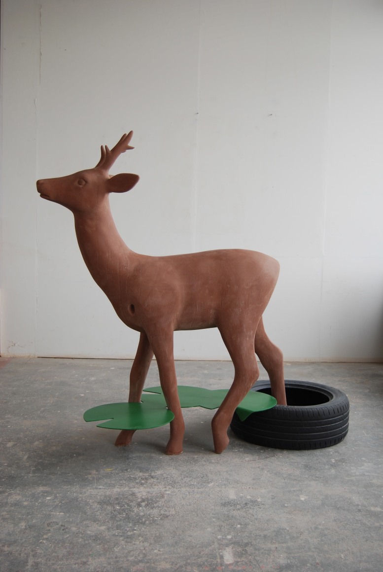 KENNY HUNTER Like Water in Water 2009, resin, jesmonite, steel, paint, 35.43 x 59.06 x 23.62 inches.