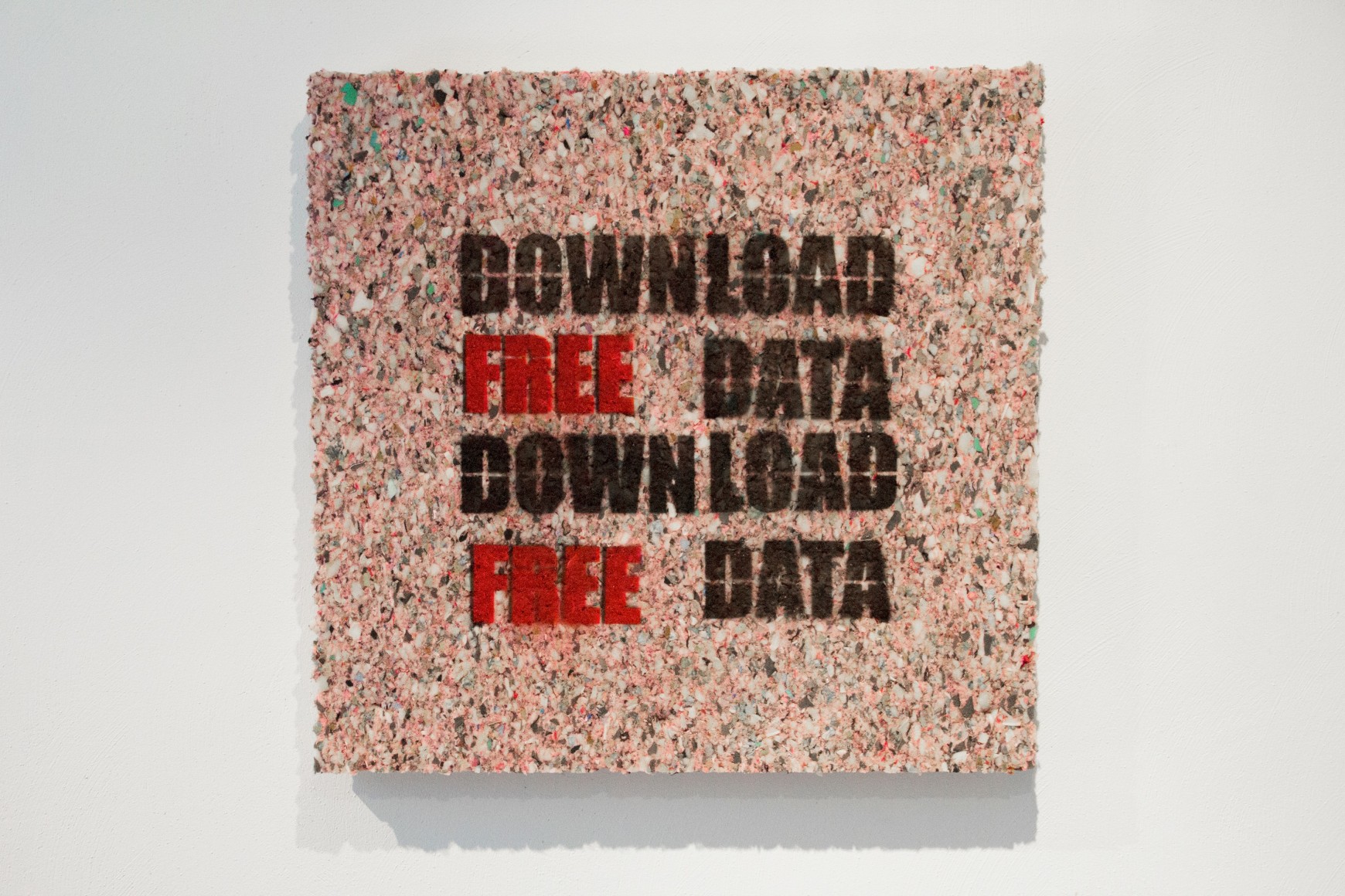 ELIOT HICKS freedata zip, 2015, carpet padding, plywood, aerosol paint, 24 x 24 inches.