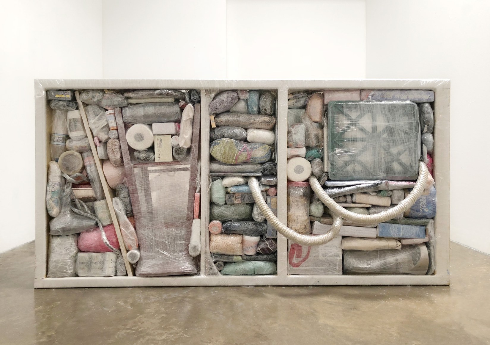 HOLLY TROUT  Packed  2018, household items, plastic moving wrap, 36 x 72 x 45 inches