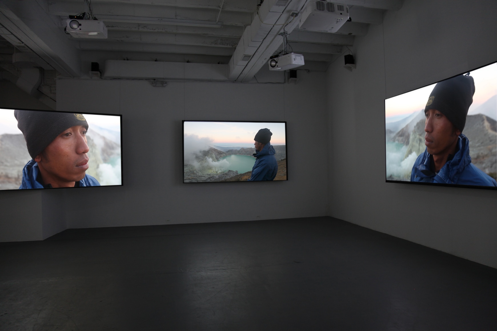 JANET BIGGS A Step on the Sun 2012, 5 channel video installation, run time: 9:22. Installation view: Conner Contemporary Art.