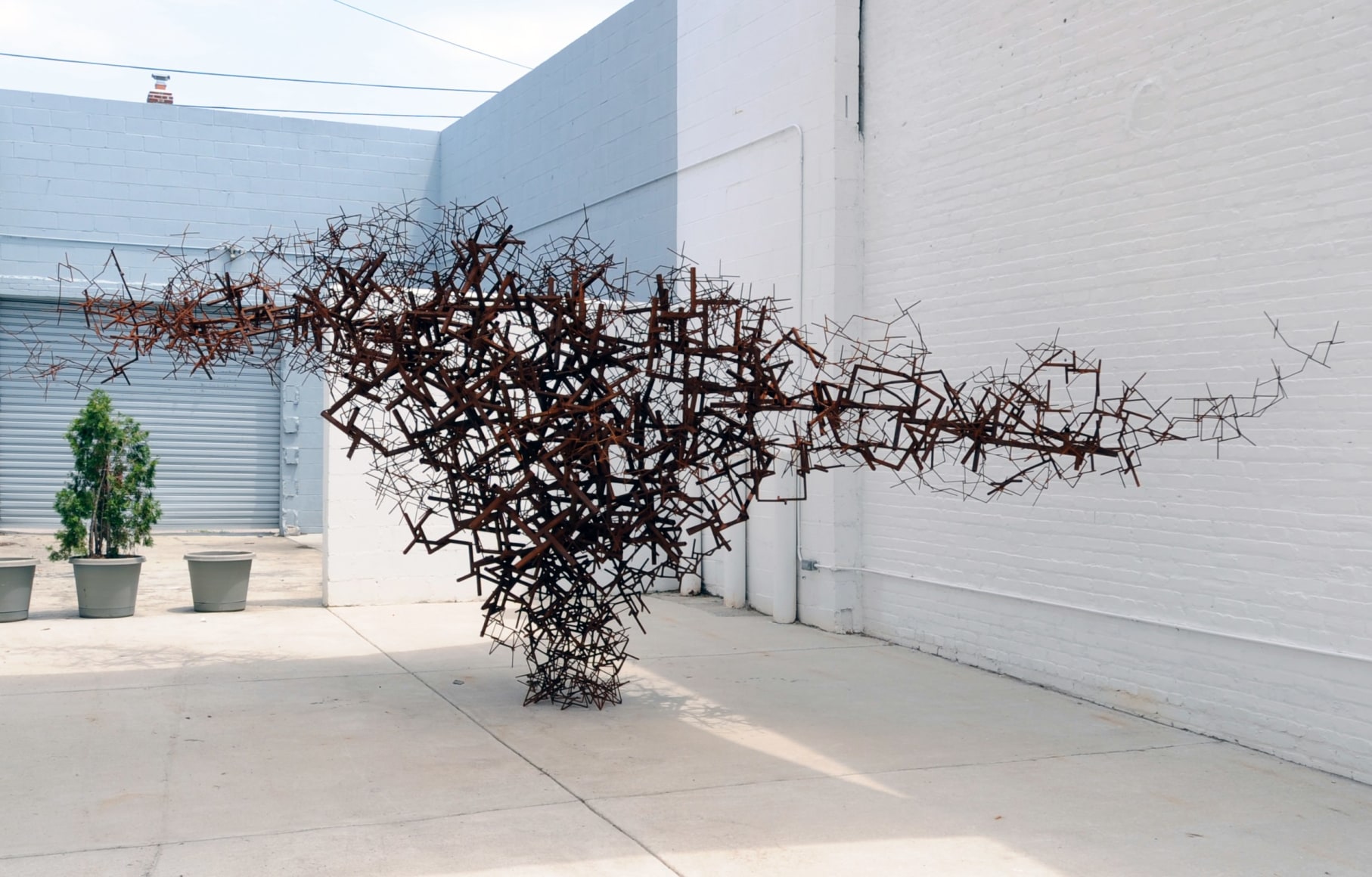 ADAM JUNIOR The Possibility of Connection 2011, steel, 96 x 288 x 96 inches. Installation view: ACADEMY 2011, Conner Contemporary Art.