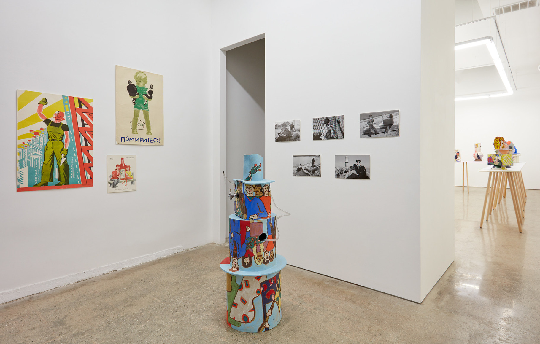Installation View of &quot;Propaganda Pots&quot;  (2018) by Bari Ziperstein specifically highlighting the &quot;Unite All People!&quot;