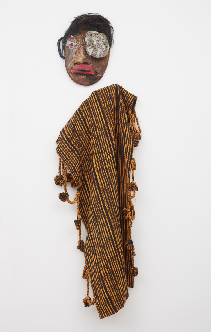 Blair Saxon-Hill Another Eye, 2018 Wood, foam, gouache, fiber reinforced plaster, cement, pigment, shell, handwoven textile, hidden red wig, fireplace cleaning bristles, rail plastic tongue eye, bluing, wicker handle 65 x 23 x 4 in 165.1 x 58.4 x 10.2 cm (BSH18.051)