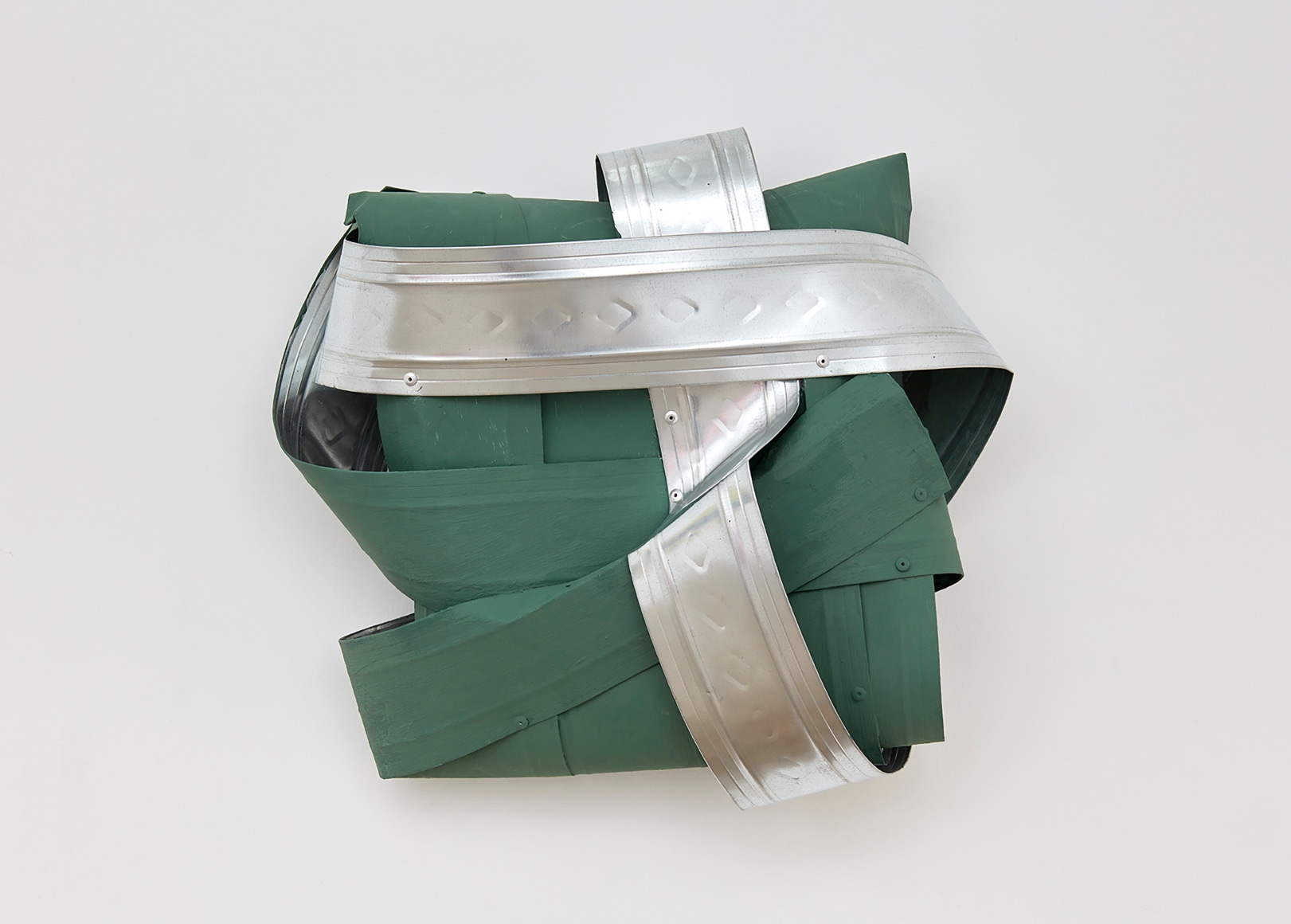 Green and silver aluminum wall-hanging sculpture.