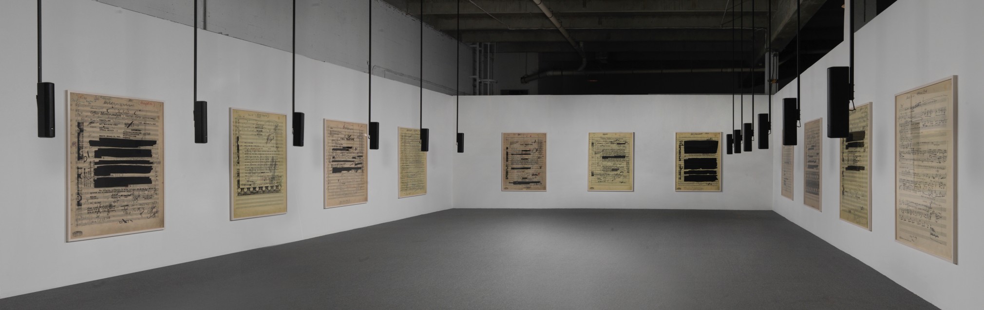 Susan Philipsz, Part File Score, 2014, twenty-four-channel sound installation and twelve digital and silkscreen prints on canvas, 36:30 min.