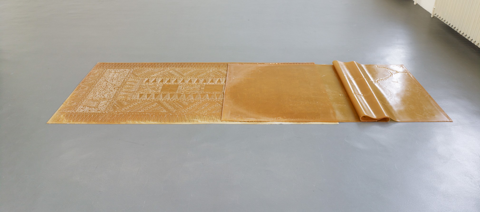 Rossella Biscotti,&nbsp;Princess of Kasiruta, 2019, Installation of two natural rubber sheets, 230 x 105 and 210 x 100 cm