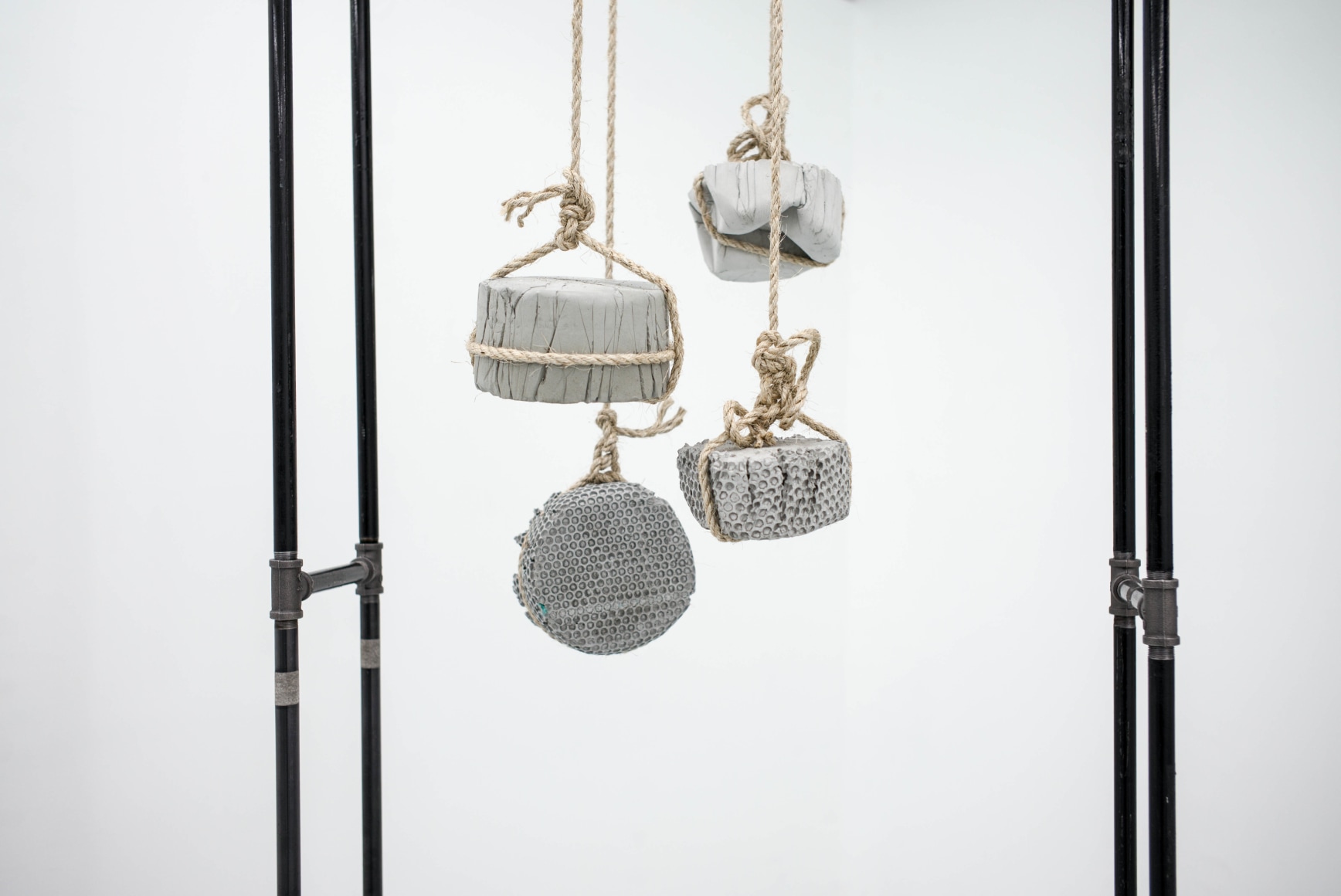 Afra Al Dhaheri, Who Has Time For It?&nbsp;(detail), 2016, Steel pipes, rope, cement and plaster, 135 x 75 cm