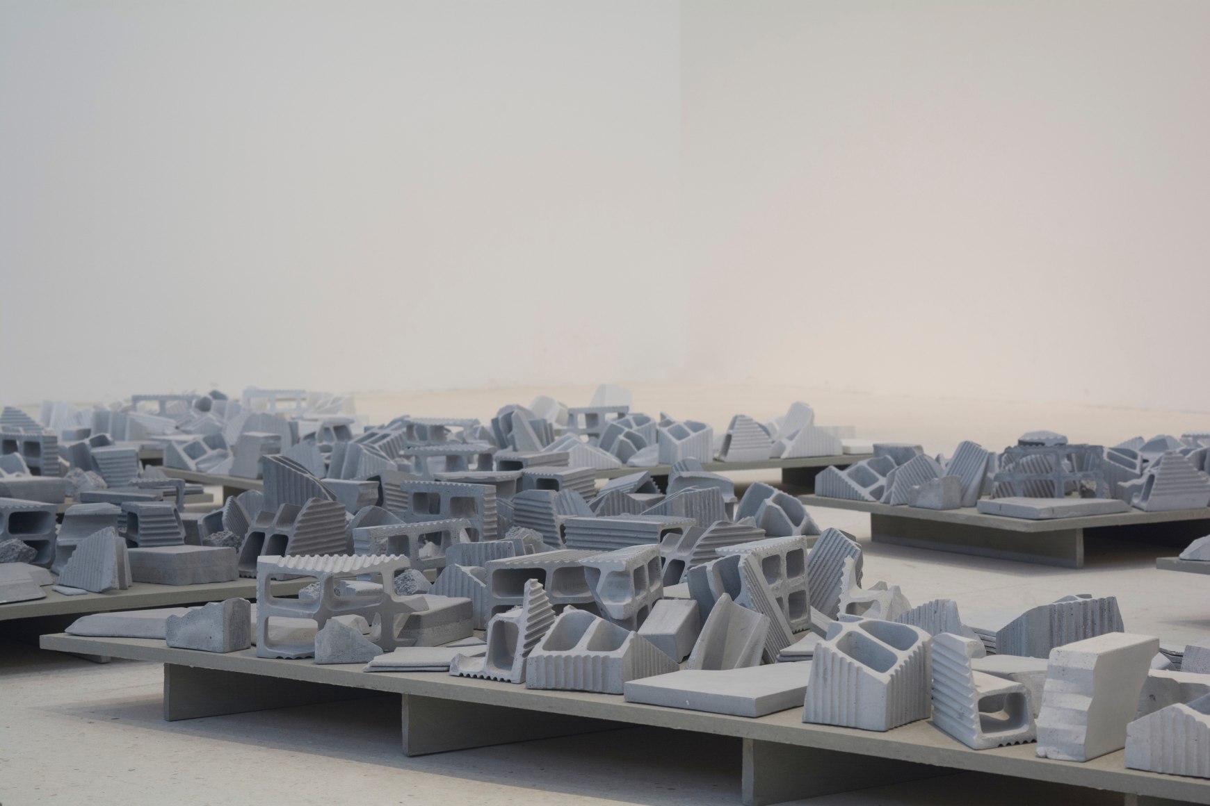 Nazgol Ansarinia, The Mechanisms of Growth, Demolishing buildings, buying waste&nbsp;(detail), 2017,&nbsp;Plaster, pigment and glue, Dimensions variable