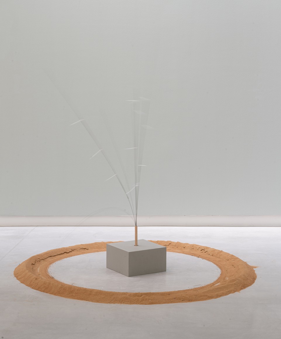 Afra Al Dhaheri, Restless Circle, 2025, Sand, nylon zip ties, cement, metal wires, motor, 14 x 14 x 150 cm