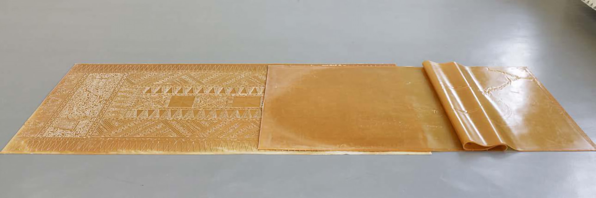 Rossella Biscotti, Princess of Kasiruta, 2019, Installation of two natural rubber sheets, 105 x 225 cm / 98.5 x 230.5 cm