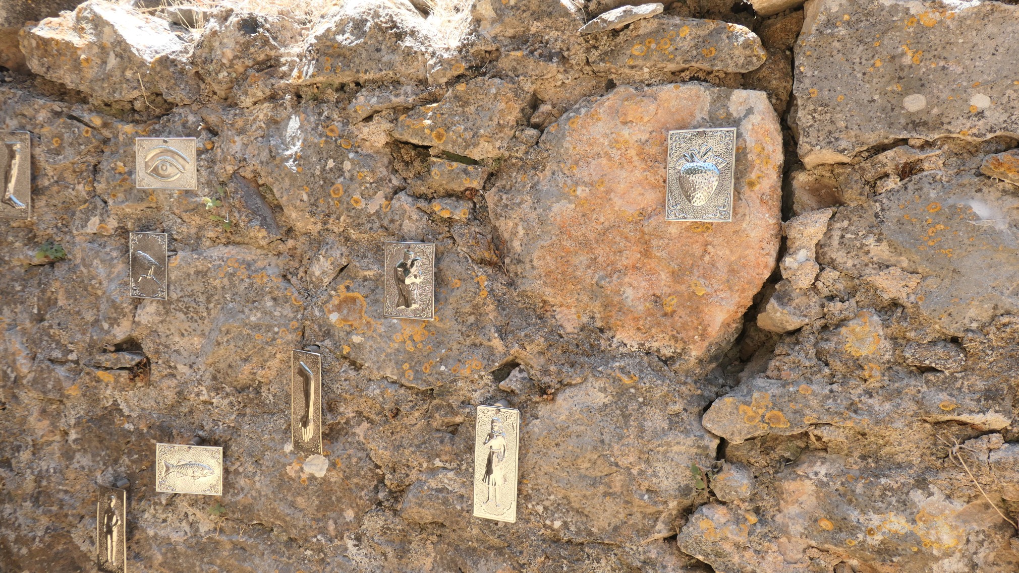 Hale Tenger, I&rsquo;d rather open my heart than become comfortably numb, 2024, Mixed-media installation including sound. Ready-made nickel tamata and unique handmade silver-plated brass tamata, iron nail, brass bracket and directional speaker, Dimensions variable