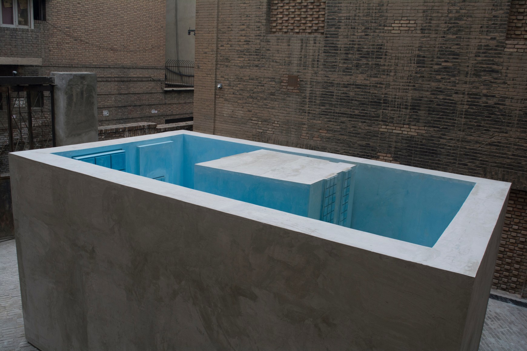 Nazgol Ansarinia,&nbsp;The Inverted Pool, 2019, Concrete, metal, pigment and plaster