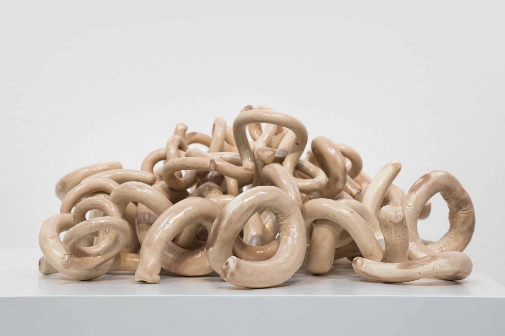 Afra Al Dhaheri, Indomie curls, 2021, Glazed white stoneware, 35 x 35 x 20 cm