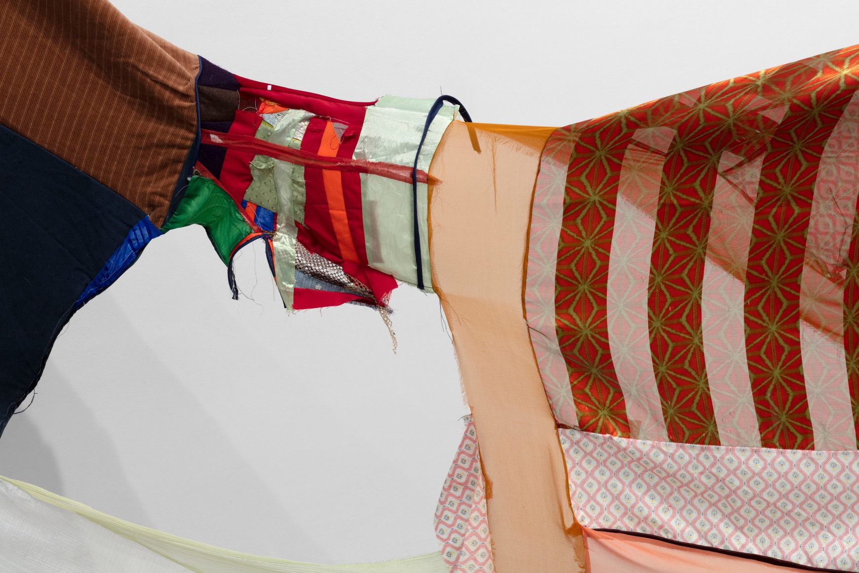 Detail of Eric N. Mack  'Chloe&rsquo; is just the name of the girl in the photograph, 2019  assorted fabric, t-shirt, corduroy, oil cloth, Missoni knit, and thread  72 x 284 x 192 in. (182.9 x 721.4 x 487.7 cm)