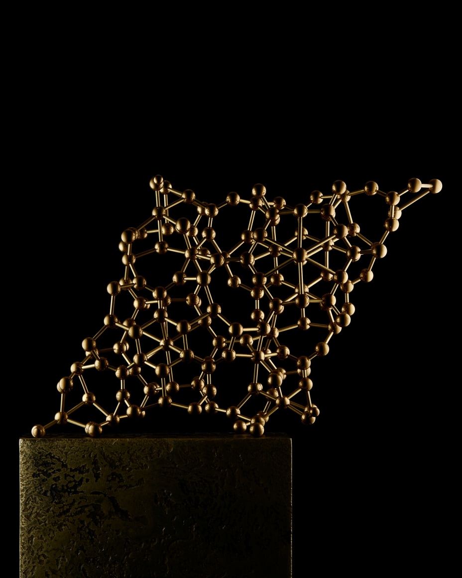 Tourmaline brass molecular model photograph for wilensky exquisite minerals habits exhibition. tourmaline fine mineral unit cell