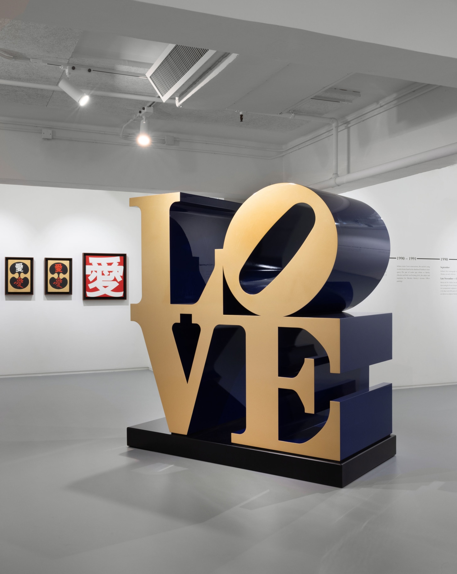 Installation view of Robert Indiana, Ben Brown Fine Arts, Hong Kong,&nbsp; December 7, 2021&ndash;March 8, 2022. Left to right,&nbsp;The Ginkgo &Agrave;i (2006),&nbsp;The Ginkgo &Agrave;i (2006), &Agrave;i (2002), and LOVE (Gold Faces Blue Sides) (1966&ndash;2002)