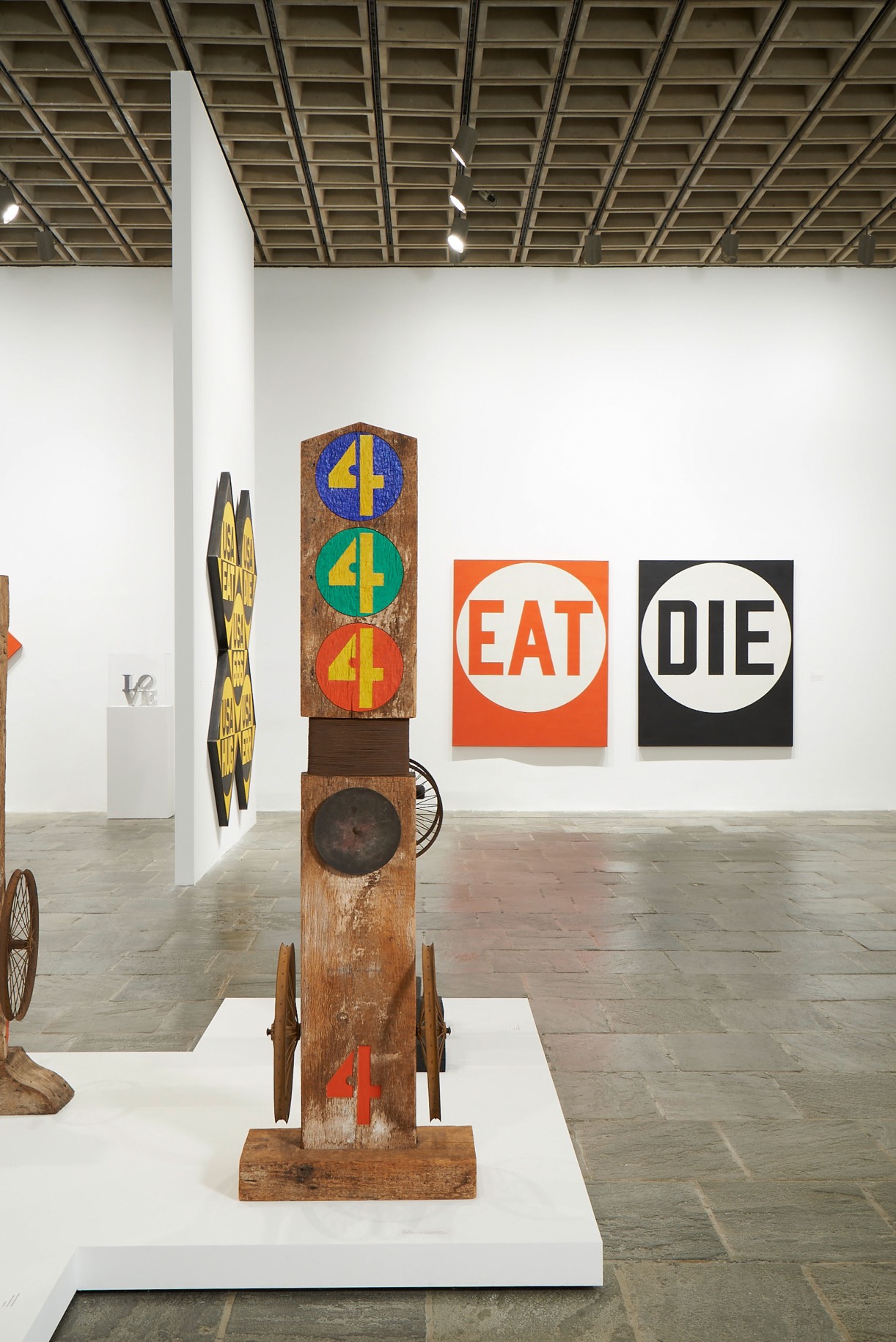Installation view of&nbsp;Robert Indiana: Beyond LOVE, Whitney Museum of American Art, New York, September 26, 2013&ndash;January 5, 2014. Left to right, LOVE (1966&ndash;1968), USA 666 (The Sixth American Dream) (1964&ndash;66), Four (1959&ndash;62/1972), and Eat/Die (1962). Photo: Tom Powel Imaging; Artwork: &copy; Morgan Art Foundation Ltd./Artists Rights Society (ARS), NY