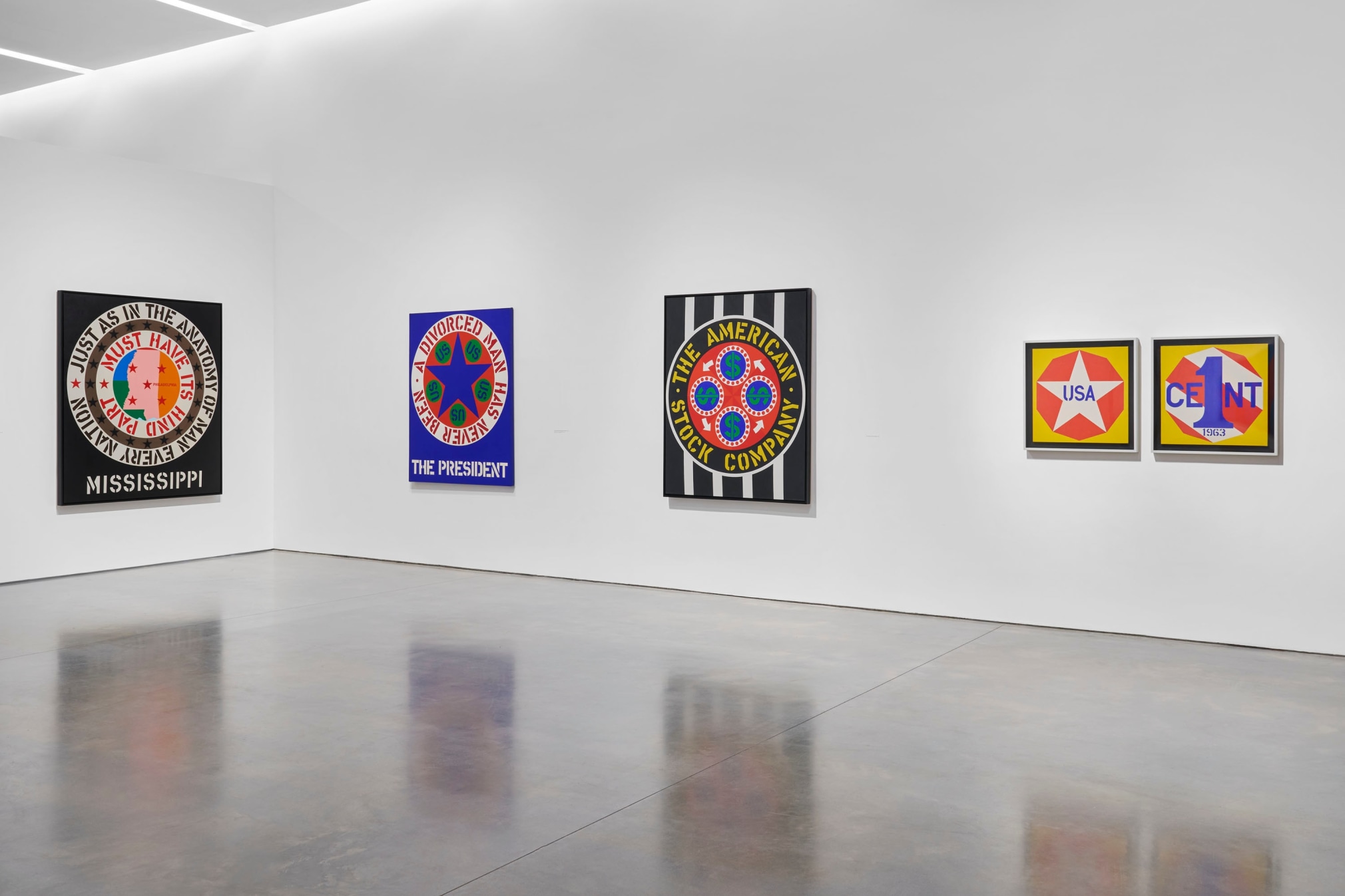 Installation view, Robert Indiana: The American Dream, Pace Gallery, New York, May 9&ndash;August 15, 2025. Left to right, Mississippi (1965), A Divorced Man Has Never Been the President (1961&ndash;62), The American Stock Company (1963), and New Glory Penny (1963)