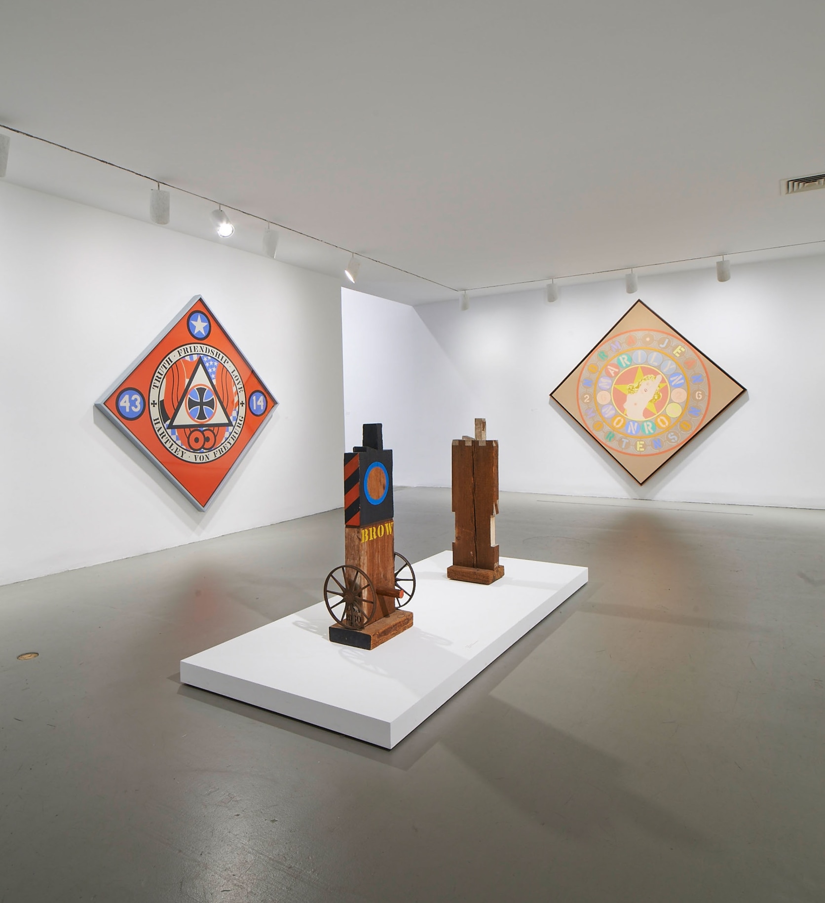 Installation view of Robert Indiana: Beyond LOVE, Whitney Museum of American Art, New York, September 26, 2013&ndash;January 5, 2014. Left to right,&nbsp;KvF X (Hartley Elegy) (1989&ndash;94), Brow (1960&ndash;62), M (1960), and The Metamporhosis of Norma Jean Mortenson (1967), &nbsp;