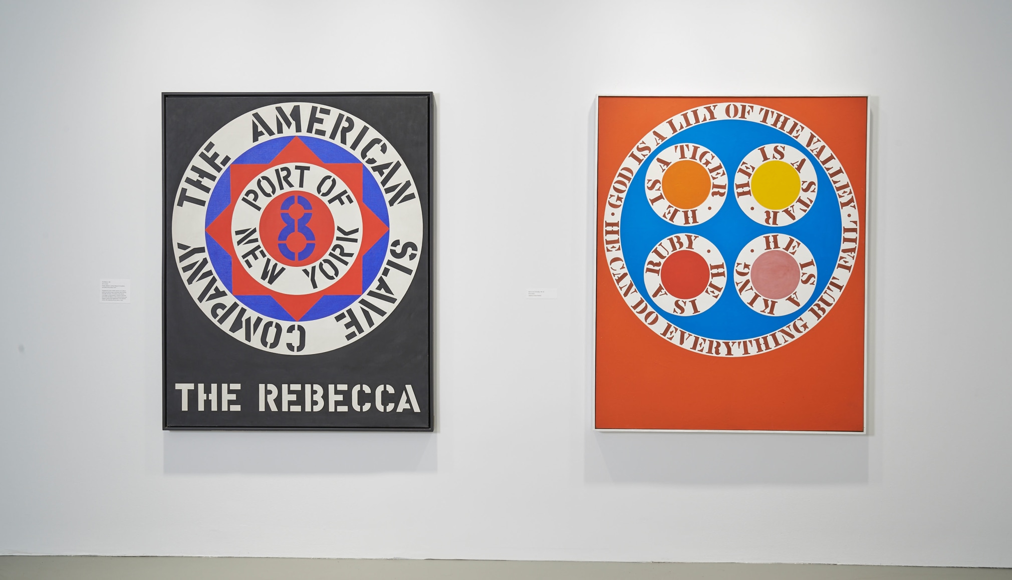 Installation view of Robert Indiana: Beyond LOVE, Whitney Museum of American Art, New York, September 26, 2013&ndash;January 5, 2014. Left to right, The Rebecca (1962) and God Is a Lily of the Valley (1961&ndash;62). Photo: Tom Powel Imaging