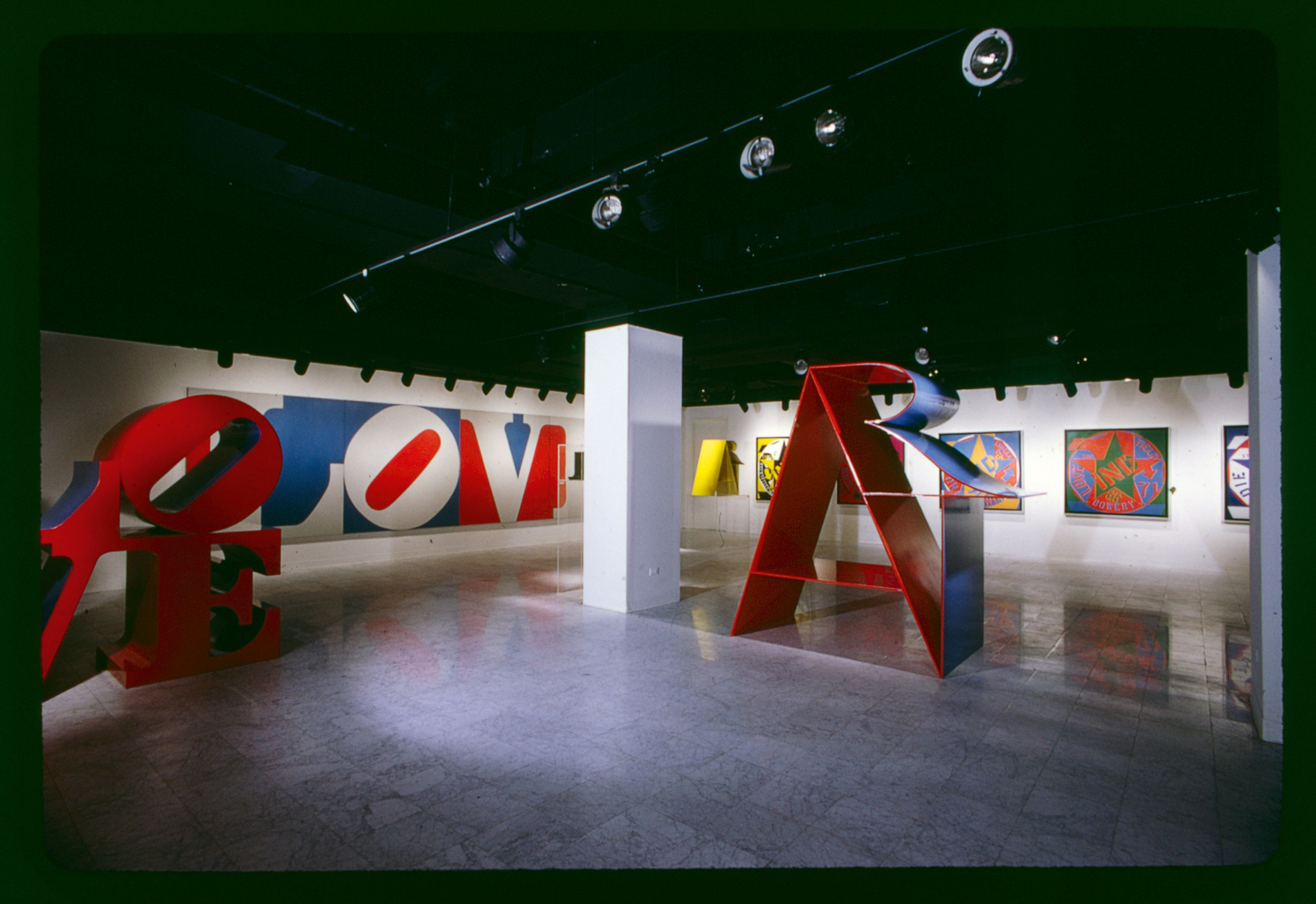 Installation view, Robert Indiana: New Paintings and Sculpture, Galerie Denise Ren&eacute;, New York, November 22&ndash;December 30, 1972. Left to right, LOVE (1966), The Louisiana Purchase Variation (1972), ONE (1972), ART (1972), ART (1972), and, on the rear right wall, part of the Decade Autoportrait series covering the years 1961 through 1965. Photo: Hans Namuth. Courtesy Center for Creative Photography, University of Arizona &copy; 1991 Hans Namuth Estate