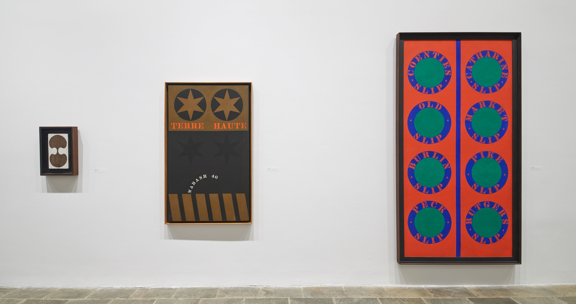 Installation view of Robert Indiana: Beyond LOVE, Whitney Museum of American Art, New York, September 26, 2013&ndash;January 5, 2014. Left to right, Ginkgo (1960), Terre Haute (1960), and The Slips (1959&ndash;60). Photo: Tom Powel Imaging; Artwork: &copy; Morgan Art Foundation Ltd./Artists Rights Society (ARS), NY