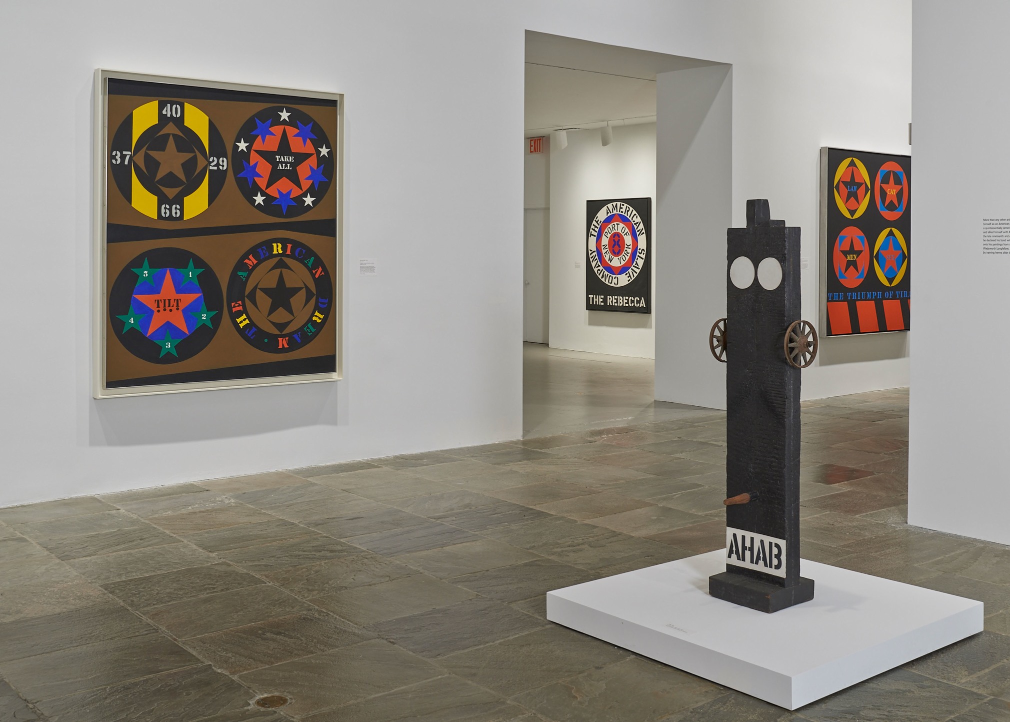 Installation view of Robert Indiana: Beyond LOVE, Whitney Museum of American Art, New York, September 26, 2013&ndash;January 5, 2014. Left to right, The American Dream, I (1960&ndash;61), The Rebecca (1962), Ahab (1960&ndash;62), and The Triumph of Tira (1960&ndash;62). Photo: Tom Powel Imaging; Artwork: &copy; Morgan Art Foundation Ltd./Artists Rights Society (ARS), NY