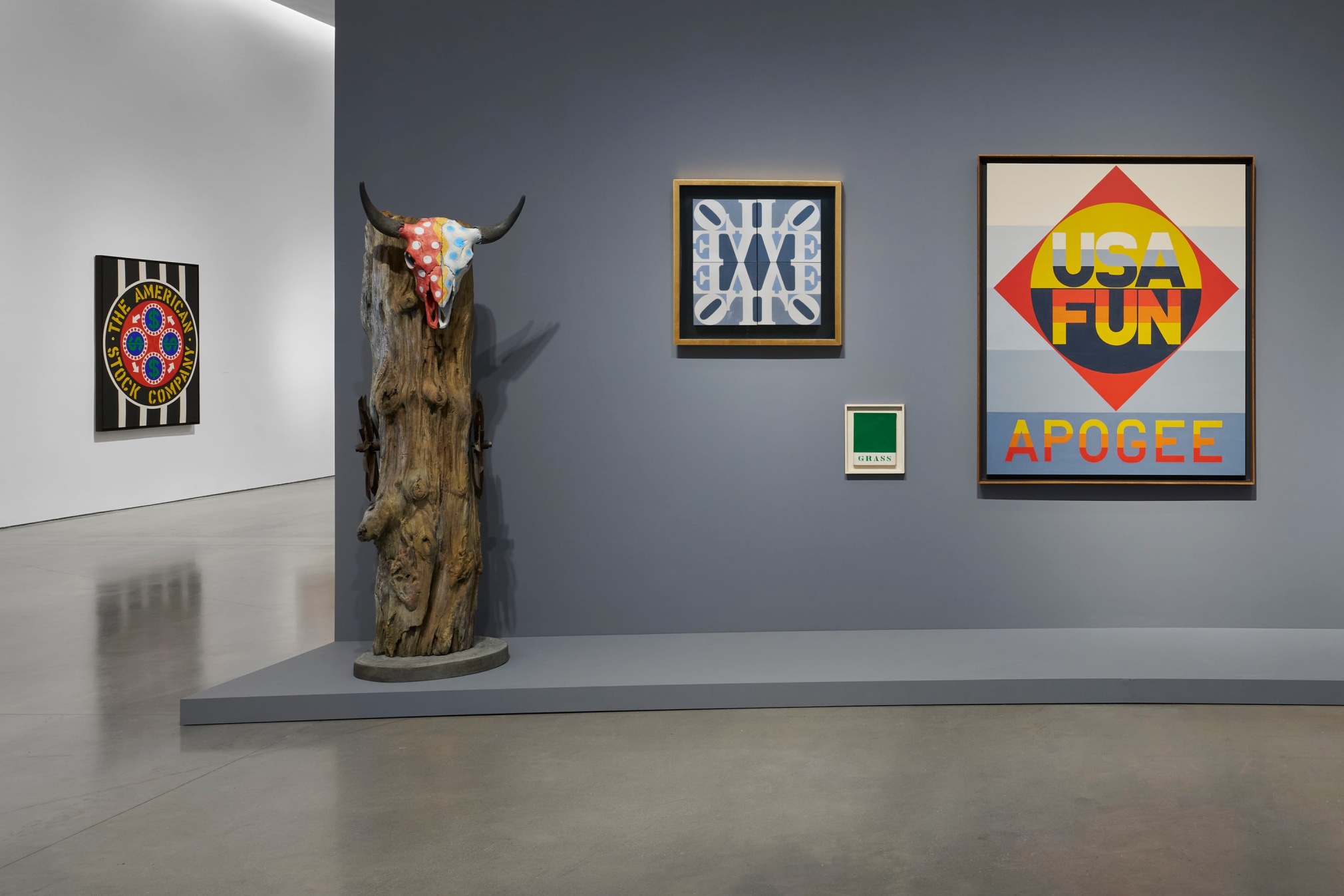 Installation view, Robert Indiana: The American Dream, Pace Gallery, New York, May 9&ndash;August 15, 2025. Left to right, The American Stock Company (1963), USA (1996&ndash;1998, cast 2017), LOVE Wall (1968), Grass (1962), and Apogee (1970).