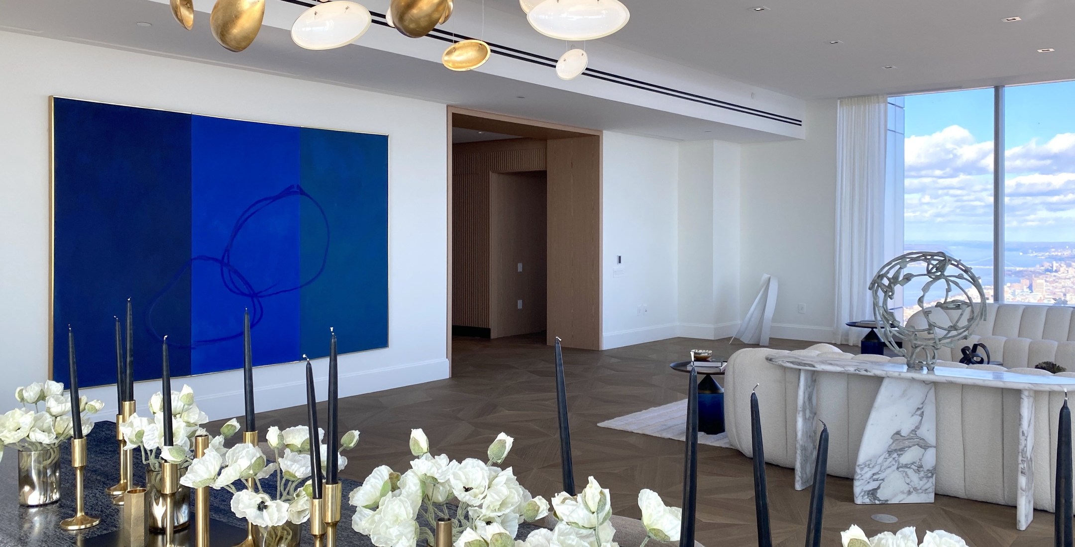 Loretta Howard Gallery presents a series of installations of art in homes and interiors. In this installation towering above midtown Manhattan, the art compliments the city below. For pricing information contact anthony@lorettahoward.com, &nbsp;