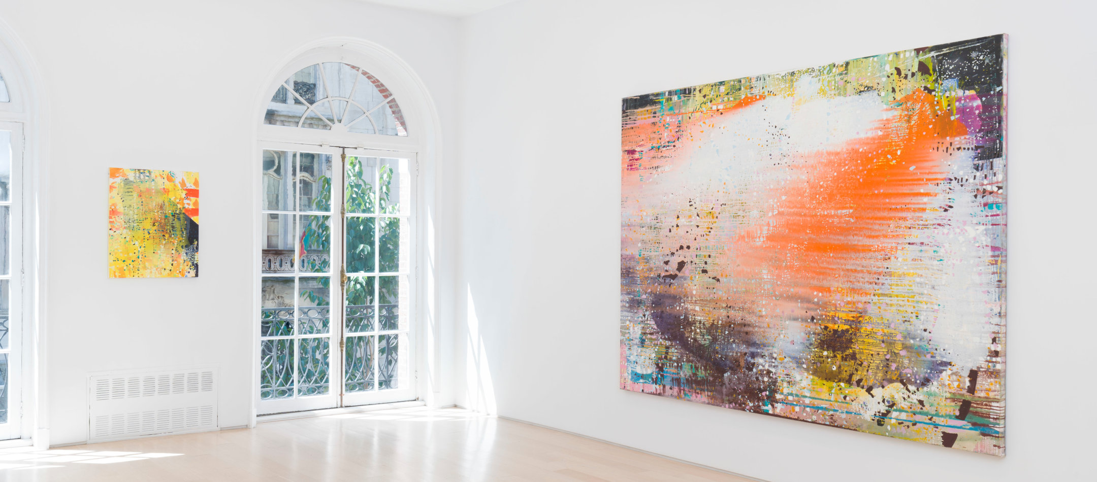 installation view with two large paintings on a white wall