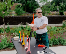 The artist Tom Sachs prepares a rocket for launch in Chicago in July. After 16 public launches in the last year, he is ending them, “so that we can focus on the next chapter, which is world-building.”Credit...Evan Jenkins for The New York Times