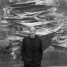 Photo of Anselm Kiefer in front of his work ‘Ages of the World’ (2014)