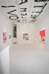 Installation view, with painted letters on ceiling