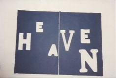 'Heaven' spelled on blue paper