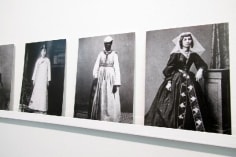 three black and white postcards of women