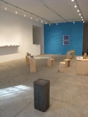 Install view, with blue wallpaper and wooden benches