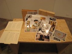 Ephemera and photos on wooden bench