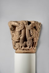 A massive capital with human figures tormented by winged serpents, c. 1100-30