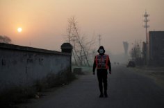 new york times | Artist Liu Bolin Live Streams Beijing Smog to Raise Awareness