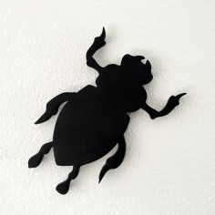 SULTAN-Donald_Beetle, July 9, 2020_waterjet cut from 3/8-inch black glass, sandblasted, and kiln formed_12x8x3/8_ed10