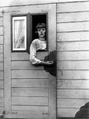 August Sander, Girl in circus caravan, 1926, image 10.5 x 8 inches/mount 17.25 x 13.25 inches, Gelatin Silver Print, Signed on verso by Gerd Sander, estate stamp also on verso, Edition 11/12, Illustrated: August Sander - Citizens of the Twentieth Century, pg. 349