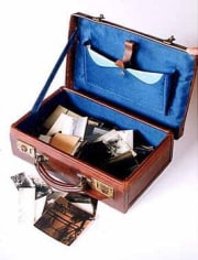 Leather suitcase with prints