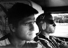 Allen Ginsberg, Ken Babbs, Captain of Ken Kesey&rsquo;s &ldquo;Trips Festival&rdquo; Bus, Co-piloting Neal Cassady, 1964, 11 x 14 inch Gelatin silver print, Ginsberg Trust stamp, signed in pencil by Bob Rosenthal, Edition of 3