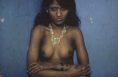 Putla, a thirteen-year-old prostitute, with a gold necklace, Bombay, 1978, 12-1/4 x 18-3/4 Dye Transfer Photograph