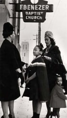 Coretta Scott King and her daughters, Yolanda and Bernice, talk with a fellow parishioner outside Ebenezer Baptist Church in Atlanta, 1963